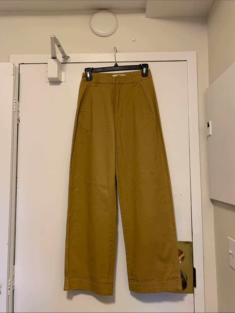twik Wide-Leg Chino Pants in Mustard Brown